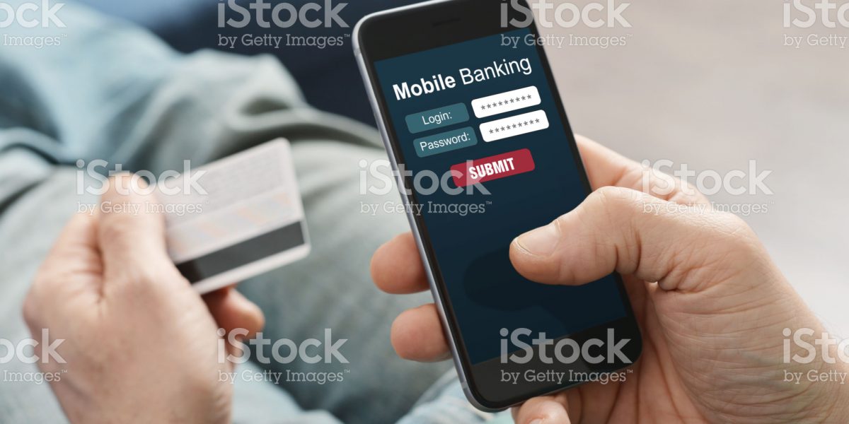 Male hands using mobile banking on smart phone